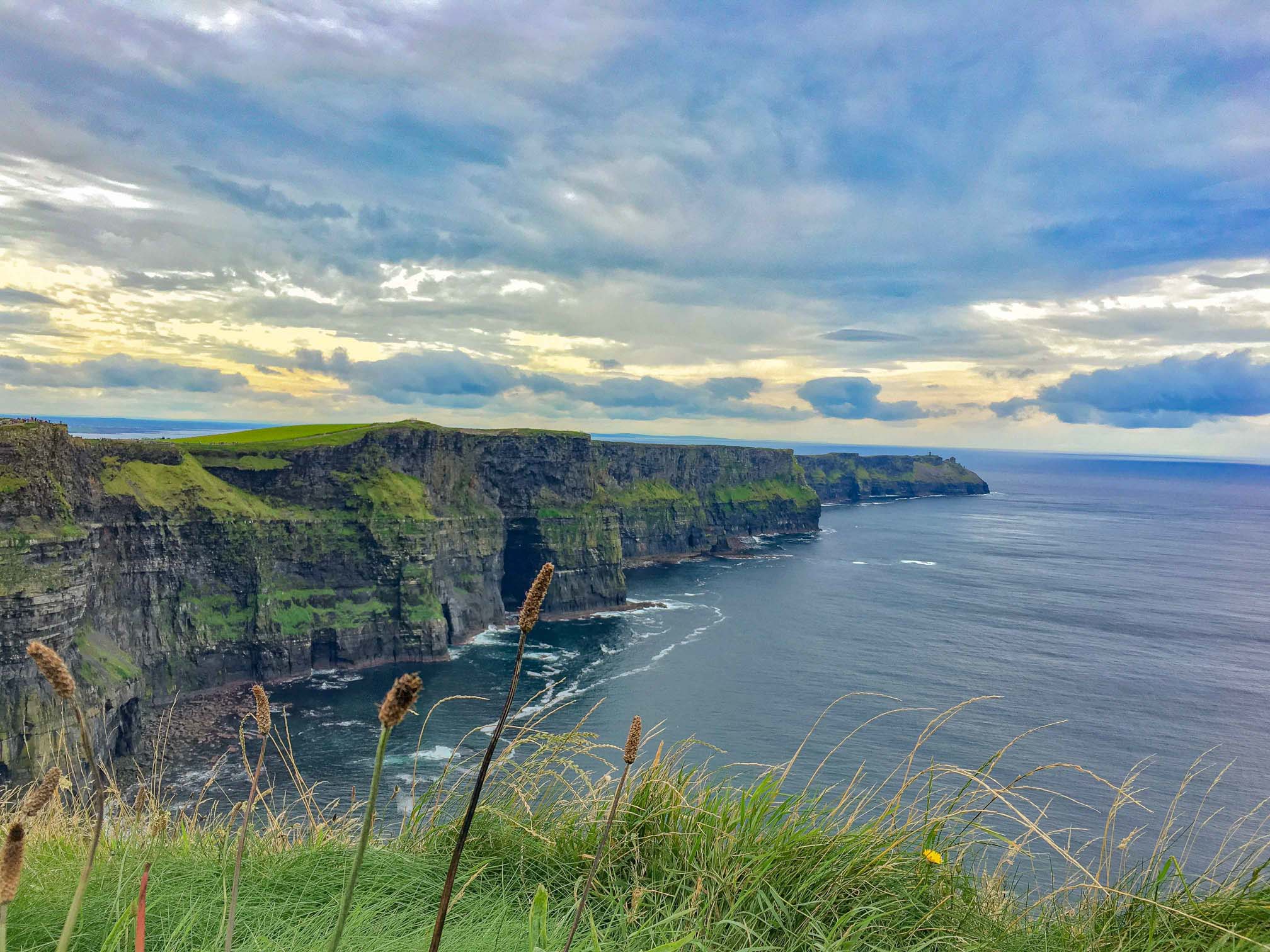 Sea cliffs and a yellow cloudy sky