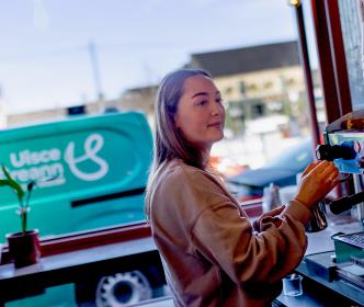 UE van outside coffee shop