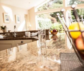 A glass of water in a kitchen