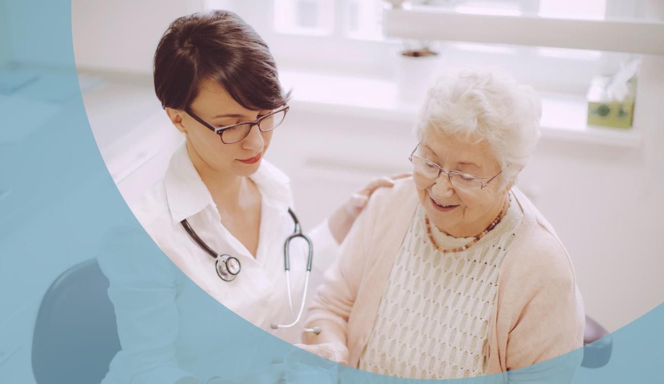 A doctor looking after an elderly in a clinic